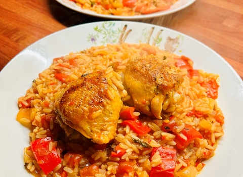 a plate of chicken risotto
